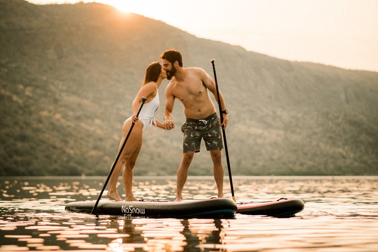 stand-up paddleboarding for couple