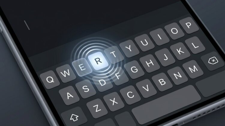 Smartphone keyboard showing visual feedback ripple effect when pressing a key on a touchscreen
